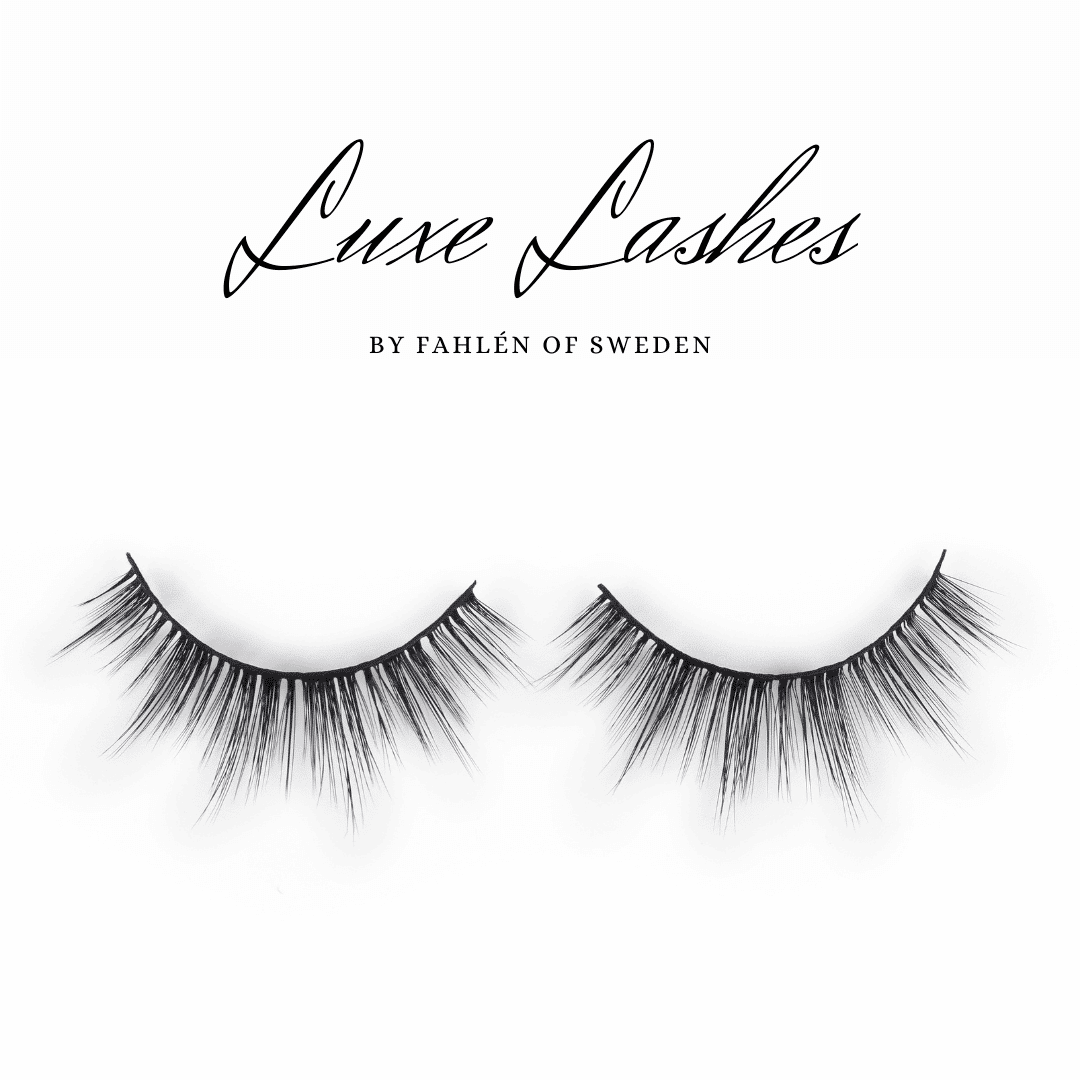 Svarta, eleganta lösögonfransar presenterade under texten Luxe Lashes by Fahlén of Sweden i stilren typografi mot vit bakgrund.