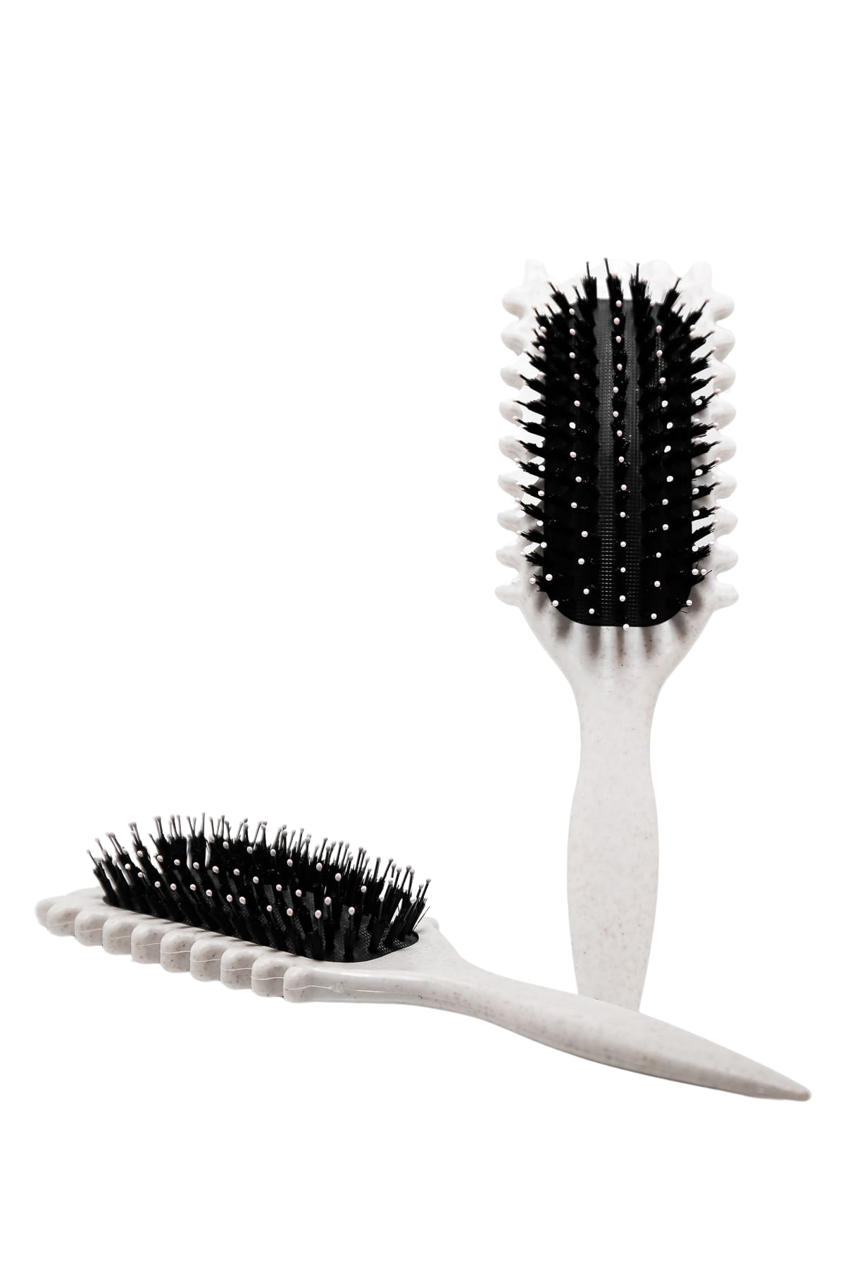 Framifrån bild av beige Bounce Curl Define Brush – borste för definierade lockar och krullar